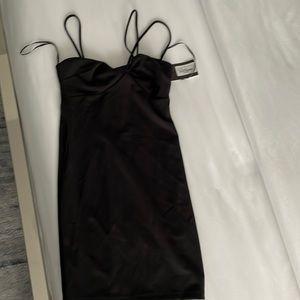Black stretchy dress. Three straps